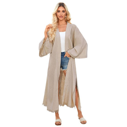 Ladies airy beach kimono with elegant cut and fringed accents Ivyshape