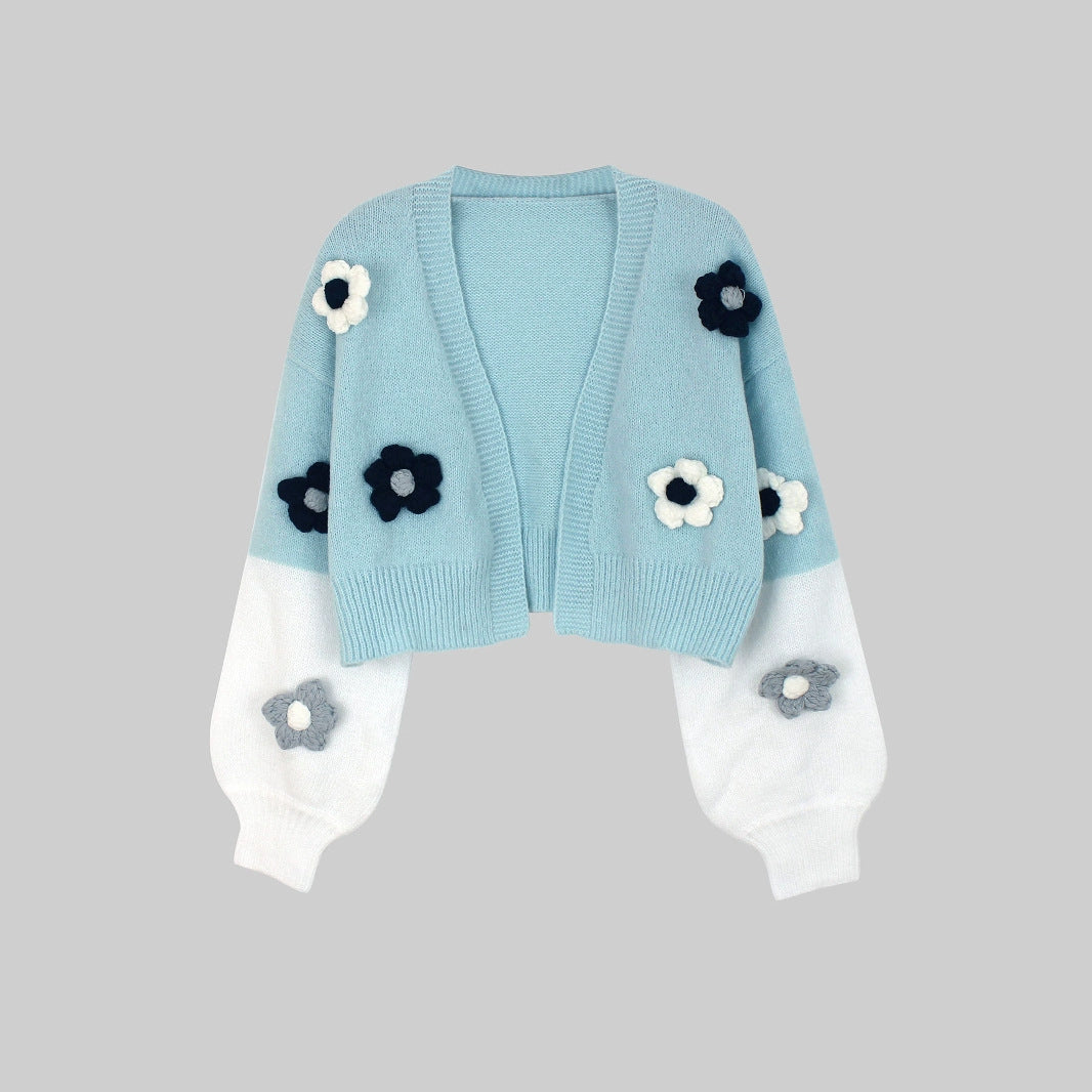 Ladies trendy knit cardigan with floral appliqués and loose fit Ivyshape